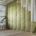 What type of insulation will be used for the house remodeling project?